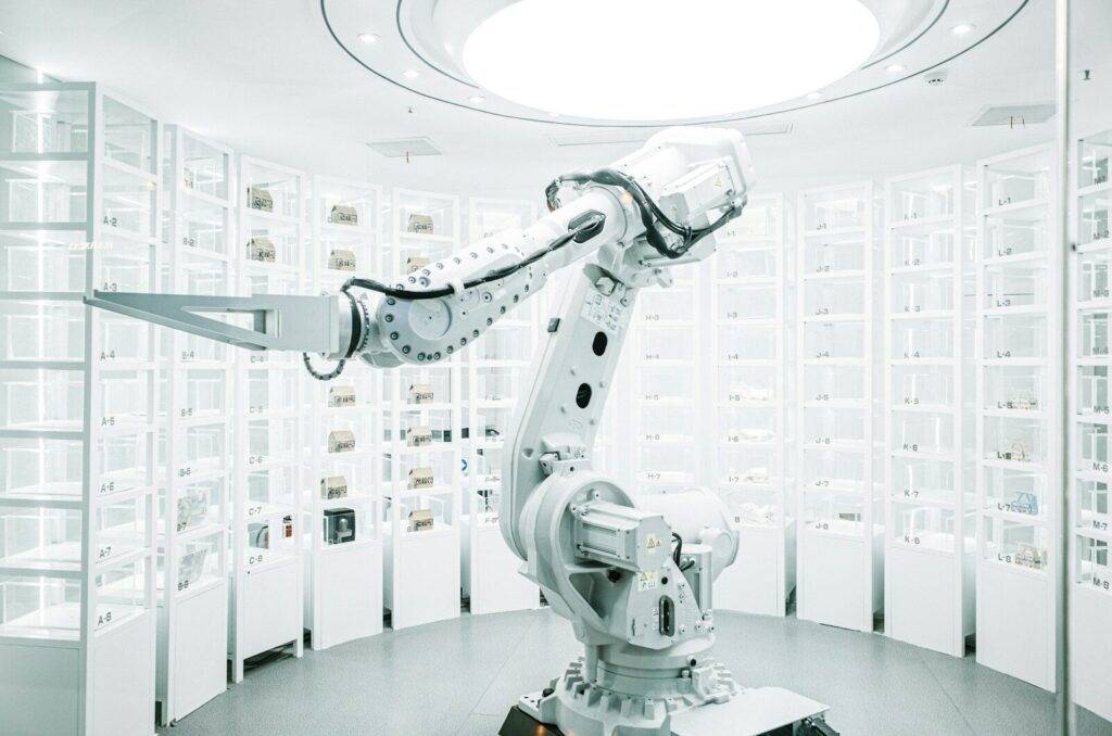white robotic arm in display showroom